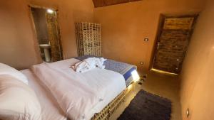 Letto o letti in una camera di Massel Belosso