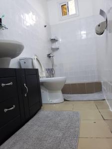 Et badeværelse på Maison indépendante proche du Centre-ville