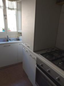 Kuchyň nebo kuchyňský kout v ubytování casa graziella