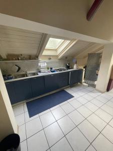 Eldhús eða eldhúskrókur á Lecasedialex it casa Kiwi