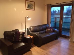 Area soggiorno di Cowshed - Duffys Ballybin 4-star