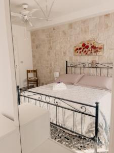 Ένα ή περισσότερα κρεβάτια σε δωμάτιο στο Villa Teresa, relax in Valle d'Itria