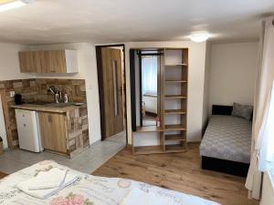 Kuchyň nebo kuchyňský kout v ubytování Apartmány Pieniny