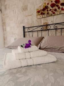 Ένα ή περισσότερα κρεβάτια σε δωμάτιο στο Villa Teresa, relax in Valle d'Itria