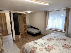 Postel nebo postele na pokoji v ubytování Apartmány Pieniny