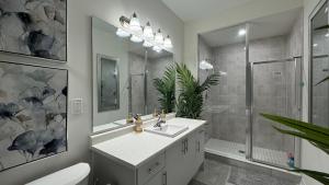 a bathroom with a sink and a shower at Ivylea Elegant Luxury Estate Richmond Hill in Richmond Hill