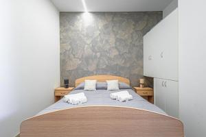 Postel nebo postele na pokoji v ubytování Al Baglio 2
