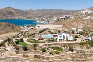 an aerial view of the village of akrotiri and the sea at On The Rocks - The Pebbles - Serviced Villas in Ios Chora