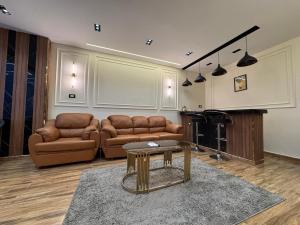 Гостиная зона в White Pyramids inn +83 фотографии