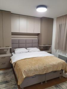 Postel nebo postele na pokoji v ubytování Villa Jezero 4 + 35 fotografií