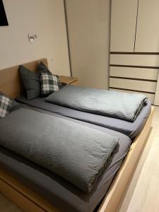 two beds sitting on top of each other in a bedroom at Klausners Ferienwohnung in Neustift im Stubaital