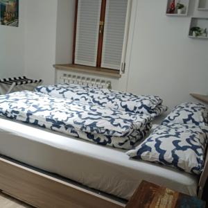 Postel nebo postele na pokoji v ubytování holiday home il tuo piccolo angolo di paradiso
