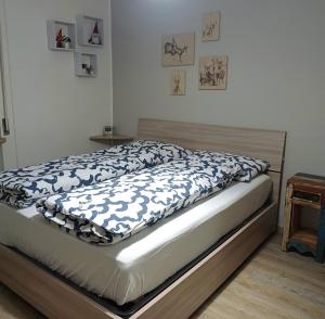Postel nebo postele na pokoji v ubytování holiday home il tuo piccolo angolo di paradiso