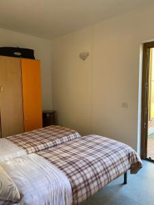Postel nebo postele na pokoji v ubytování yellow house