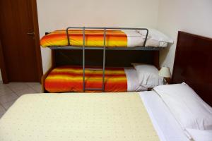 Posteľ alebo postele v izbe v ubytovaní Villa Nina