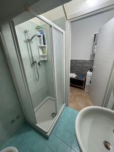 a bathroom with a shower and a sink at Appartamento A&S-Centro Argenta in Argenta