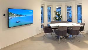 Μια τηλεόραση ή/και κέντρο ψυχαγωγίας στο Apartment WH 9