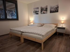 Postel nebo postele na pokoji v ubytování Ferienwohnung Sonnenseite