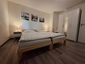 Postel nebo postele na pokoji v ubytování Ferienwohnung Sonnenseite + 10 fotografií