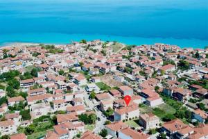an aerial view of a residential suburb with a red stop sign at Afitos Guest House in Afitos