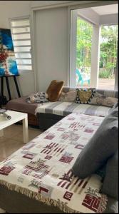 Ένα ή περισσότερα κρεβάτια σε δωμάτιο στο Maison calme en bord de mer +9 φωτογραφίες