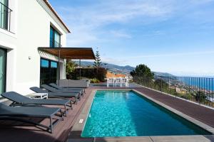 Swimmingpoolen hos eller tæt på Villa Eden Nature in Prazeres