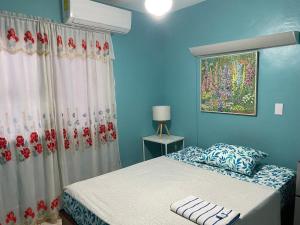 Postel nebo postele na pokoji v ubytování Casa Azul - Apartment + 37 fotografií