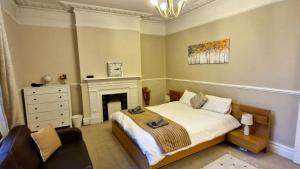 Voodi või voodid majutusasutuse Charming Flat in Wimbledon toas