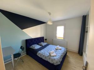 Postel nebo postele na pokoji v ubytování Gite de l'Albizia