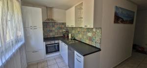 Kuchyň nebo kuchyňský kout v ubytování Apartman Mila + 2 fotografie