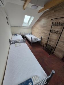 Postel nebo postele na pokoji v ubytování Rooms4Rest Skibicka - Private rooms for tourists - ATR Consulting Sp, z o,o,