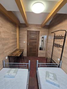 Postel nebo postele na pokoji v ubytování Rooms4Rest Skibicka - Private rooms for tourists - ATR Consulting Sp, z o,o,