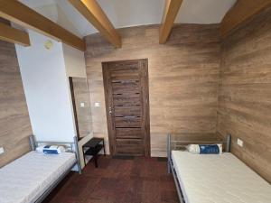 Postel nebo postele na pokoji v ubytování Rooms4Rest Skibicka - Private rooms for tourists - ATR Consulting Sp, z o,o,