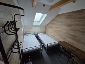 Postel nebo postele na pokoji v ubytování Rooms4Rest Skibicka - Private rooms for tourists - ATR Consulting Sp, z o,o,
