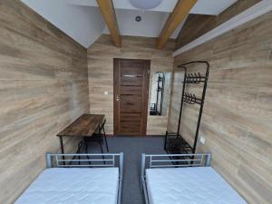 Postel nebo postele na pokoji v ubytování Rooms4Rest Skibicka - Private rooms for tourists - ATR Consulting Sp, z o,o,