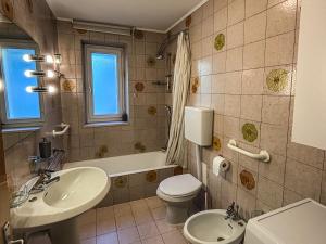 Koupelna v ubytování Casa Tone