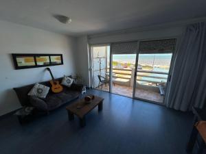 Posezení v ubytování Departamento frente al mar