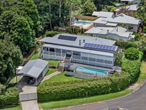 an aerial view of a house with solar panels on it at Gracious Queenslander in Bangalow