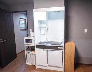 Kuchyň nebo kuchyňský kout v ubytování Mitomi inn + 30 fotografií