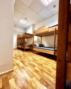 Postel nebo postele na pokoji v ubytování Hostel Cozzydine