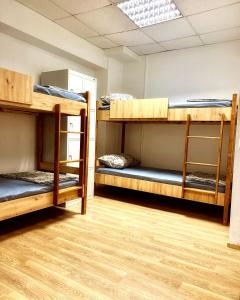Postel nebo postele na pokoji v ubytování Hostel Cozzydine
