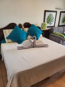 En eller flere senger på et rom på Batiment Martinique
