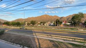 a view of a road with mountains in the background at Alojamiento Cerro de la Cruz in San Luis