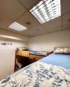 Postel nebo postele na pokoji v ubytování Hostel Cozzydine
