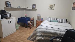 Postel nebo postele na pokoji v ubytování Vermaurel Sweet Lodge