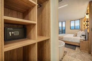 A bed or beds in a room at LIN Boutique Hotel by HOUSY HOST