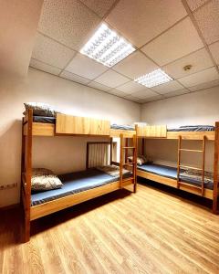 Postel nebo postele na pokoji v ubytování Hostel Cozzydine