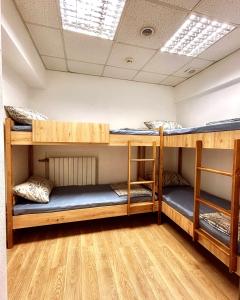 Postel nebo postele na pokoji v ubytování Hostel Cozzydine