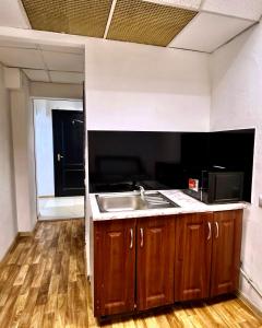 Kuchyň nebo kuchyňský kout v ubytování Hostel Cozzydine