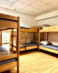 Postel nebo postele na pokoji v ubytování Hostel Cozzydine